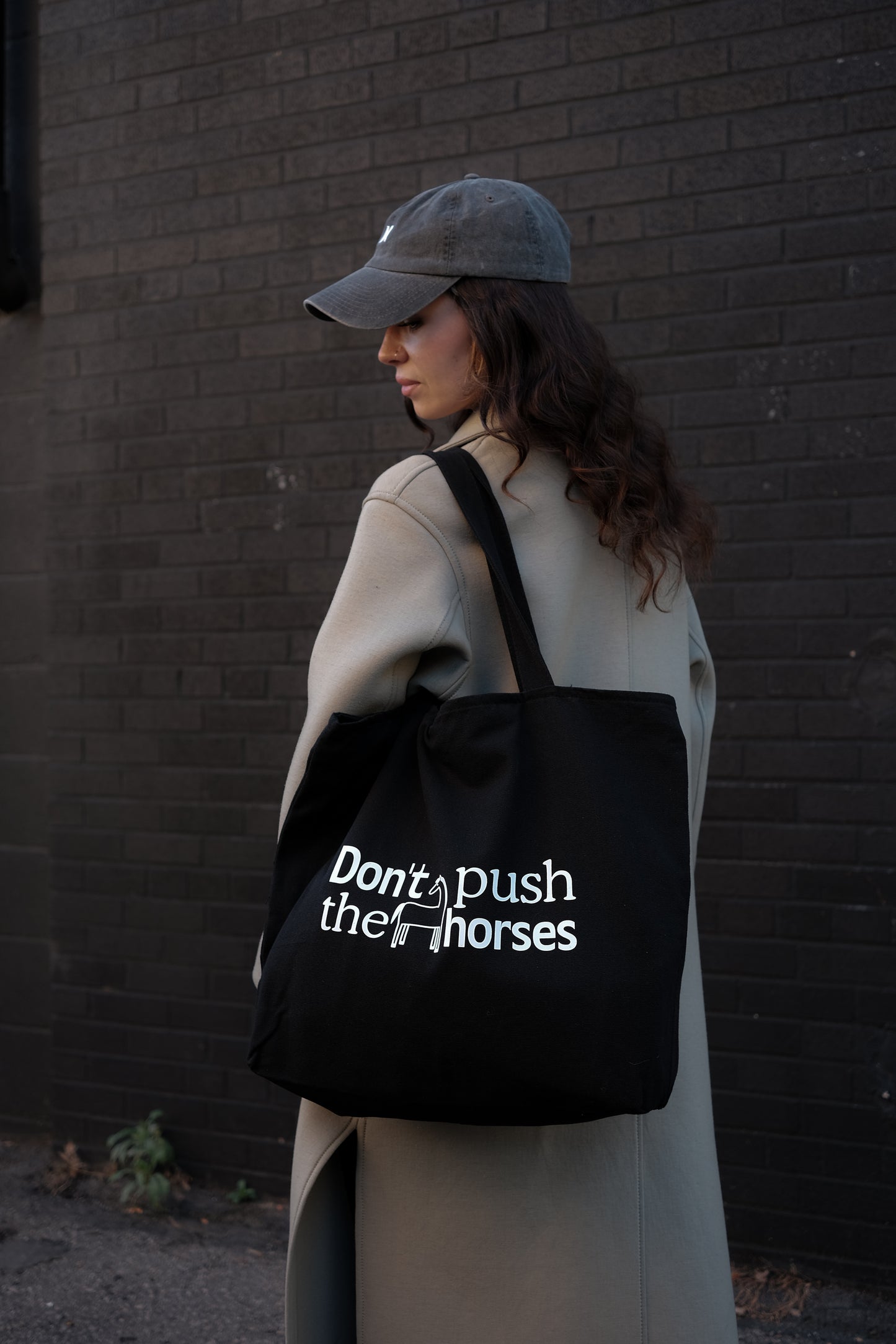 'Don't push the horses' Black Tote Bag